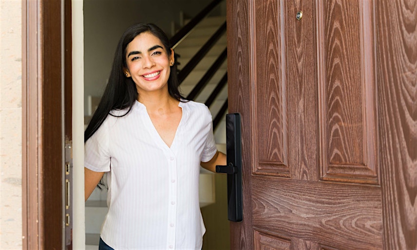Smiling woman after closing on a home